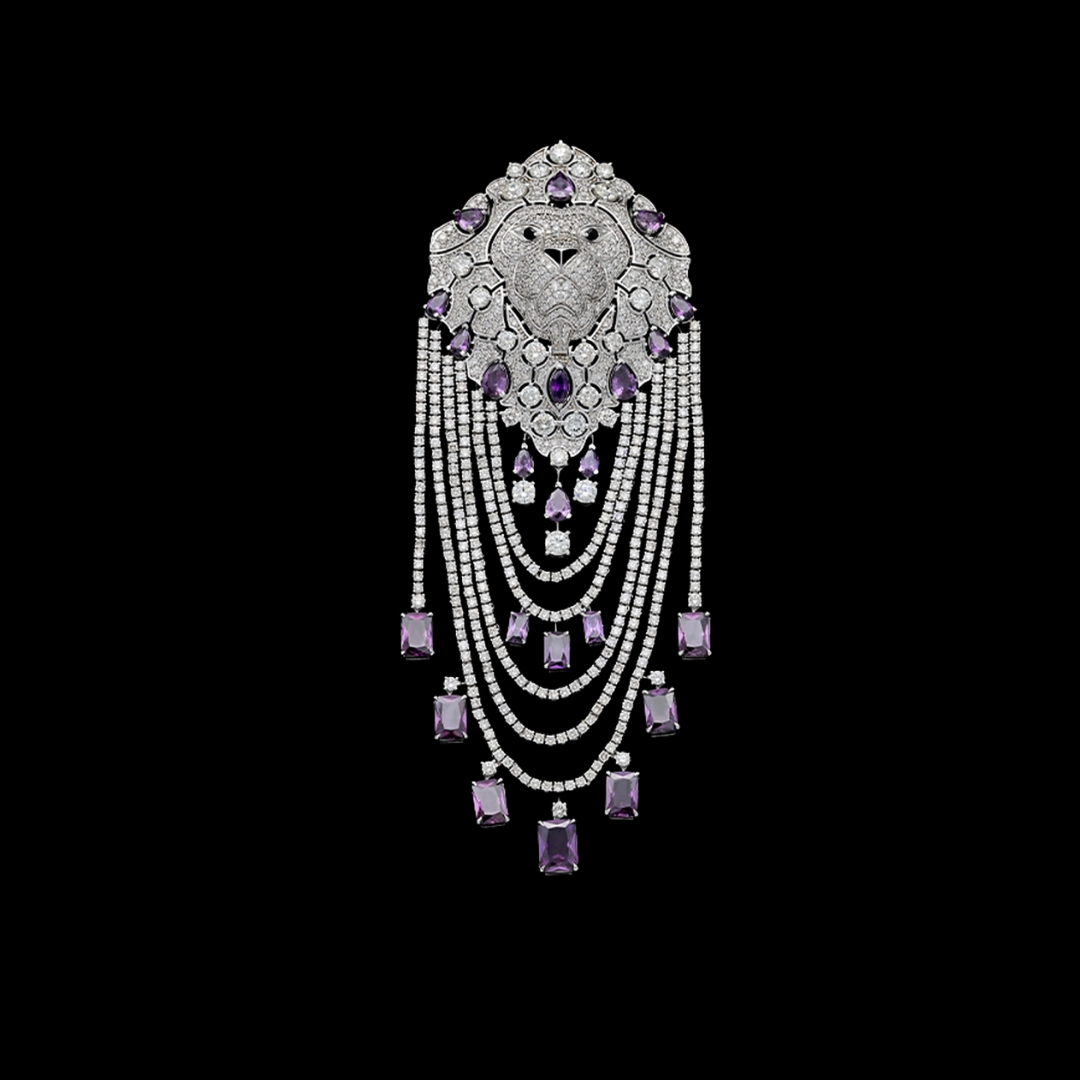 Kisna Diamond & Gold Jewellery Le Souverain groom’s jewellery accessory featuring a lion motif, diamonds, purple gemstones and cascading strands