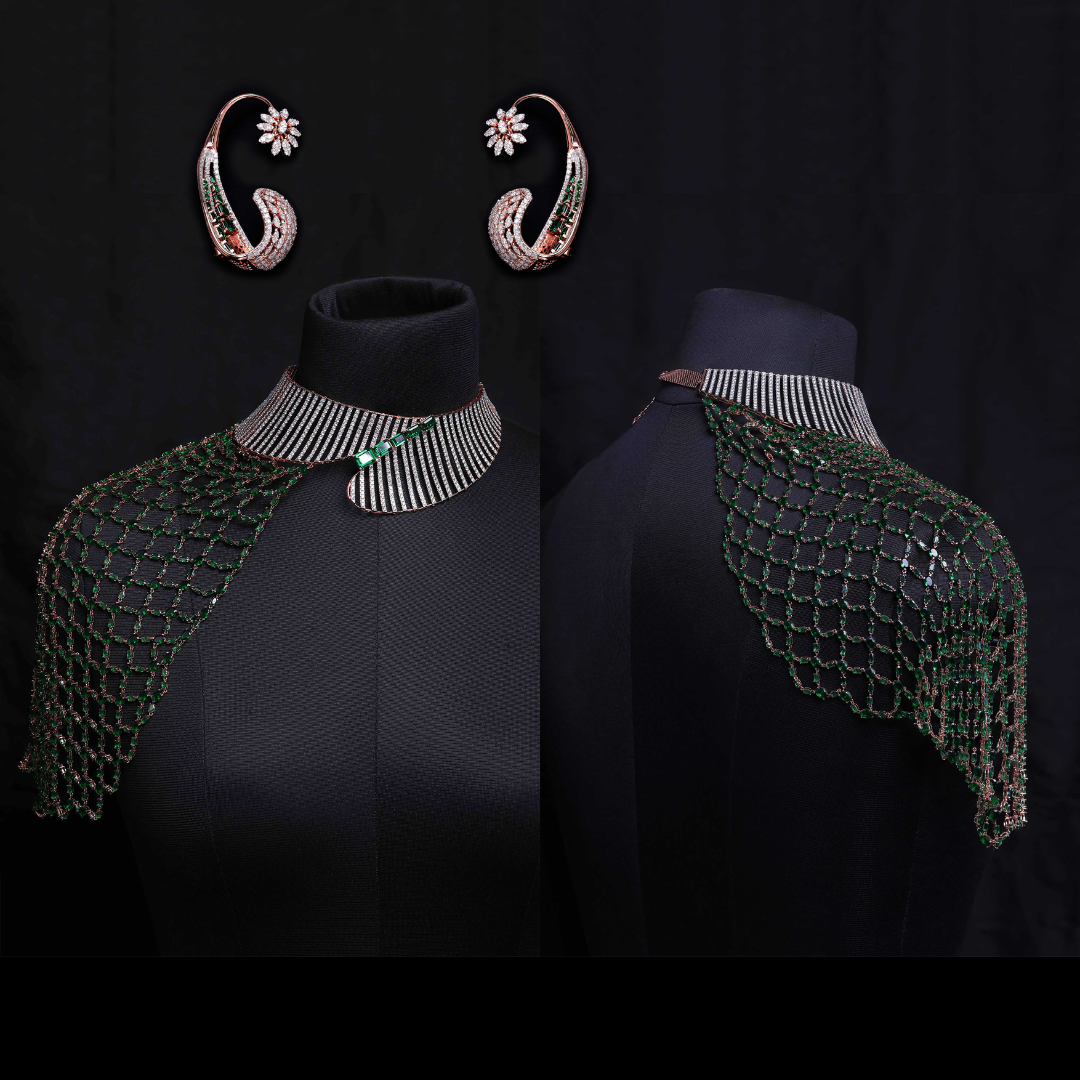 Kisna Diamond & Gold Jewellery The Emerald Armour bridal statement shoulder jewellery with green gemstone mesh and matching earrings.