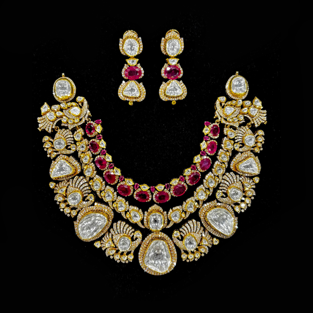Punjabi Saraf Jewellers The Nizam’s Secret bridal Polki necklace and earrings with peacock motifs, uncut diamonds and red gemstones.