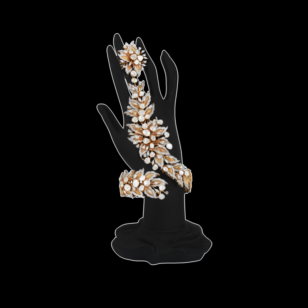 Sawansukha Jewellers The Garland of Flowers bridal hand jewellery featuring cascading floral motifs.