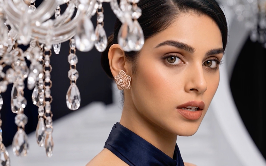 Model wearing Dhirsons Jewellers Fleur de Dentelle natural diamond floral earrings with intricate lace-inspired detailing