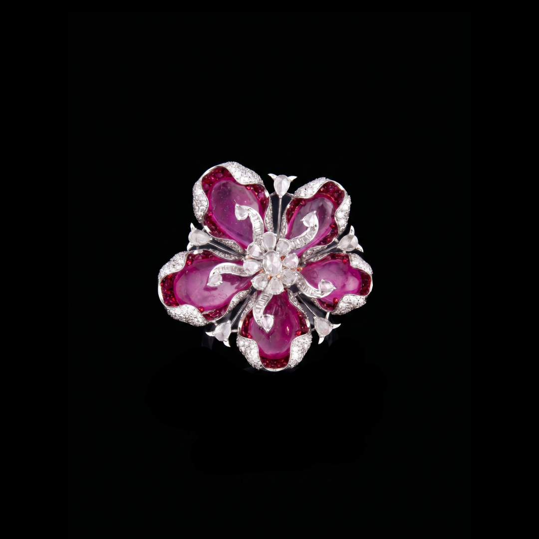 The Crimson Blossom precious coloured gemstone ring by VCJ Bespoke Jewellery featuring sculptural crimson petals and a sparkling floral centre.