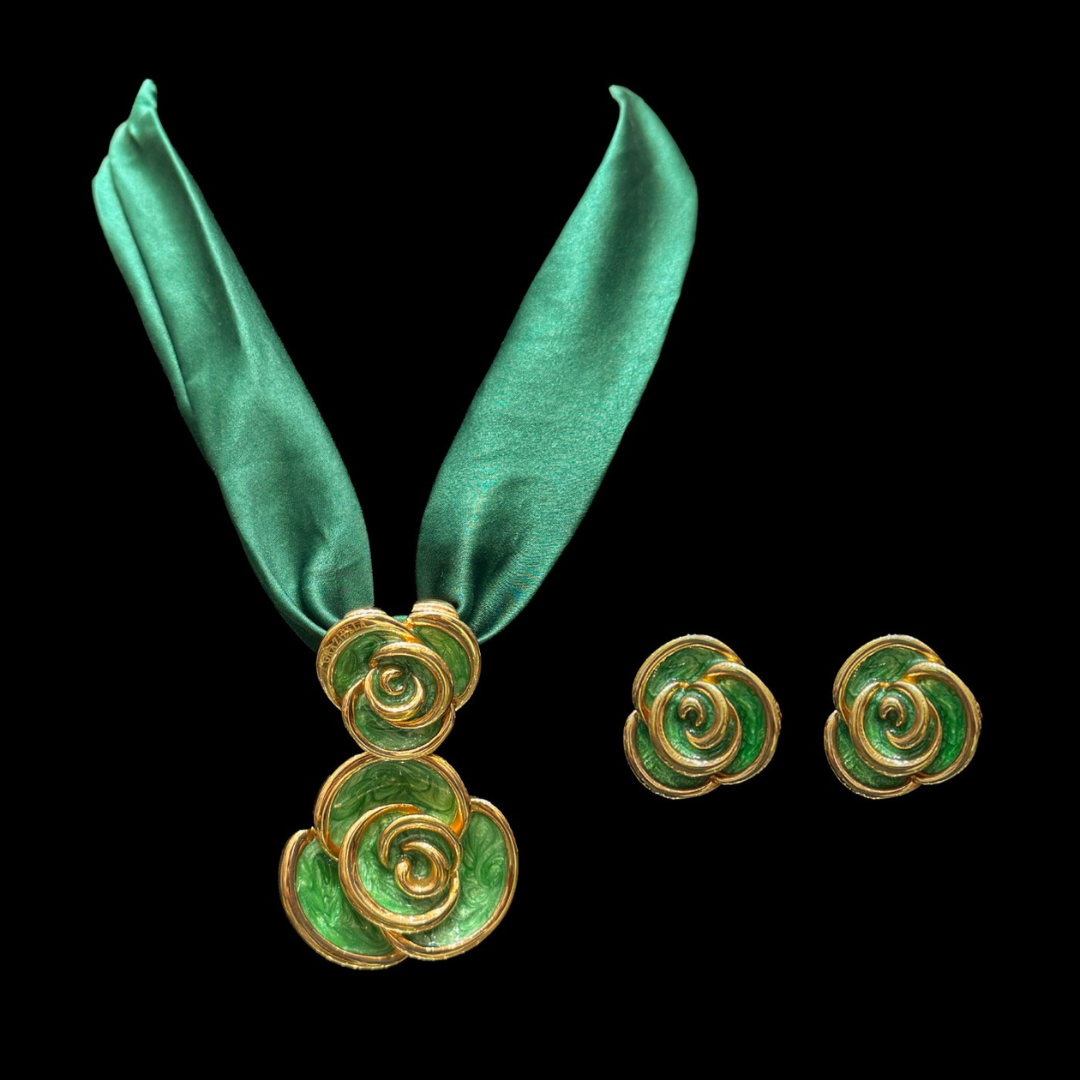 The Silk Rosette by Aabushan Jewels featuring green silk ribbons paired with green and gold spiral floral jewellery.