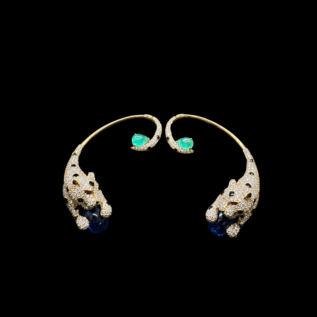 Batukbhai Sons Jewellers Wild Elegance couture jewellery featuring sculptural panthers, emerald accents, diamonds and blue gemstones.