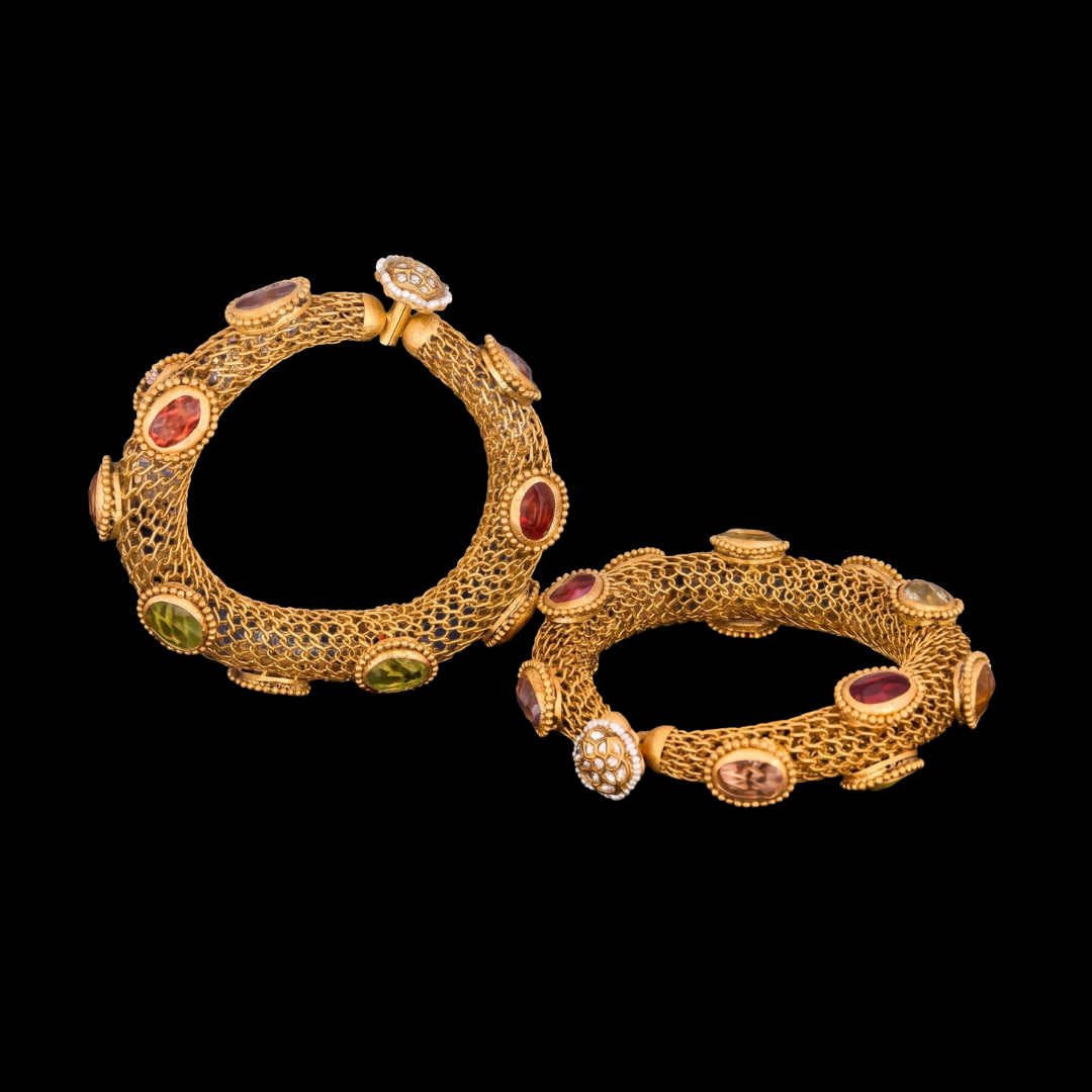 Harsahaimal Shiamlal Jewellers Navaratna Sutra gold bangles with openwork detailing and colourful Navaratna gemstones. 