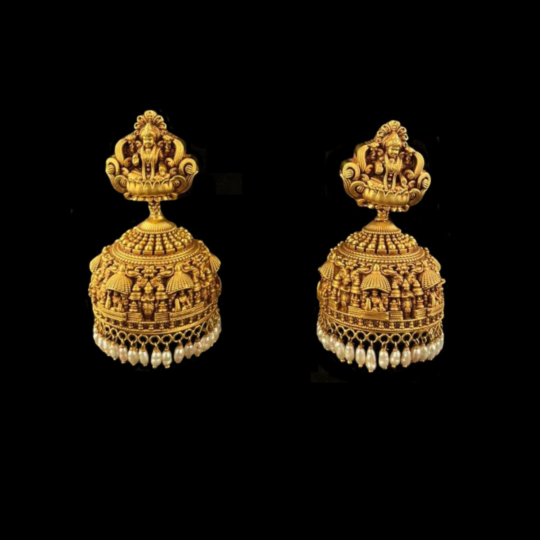 Jewellers Madanlal Chhaganlal The Royal Window gold jhumka earrings featuring Goddess motifs and intricately carved royal palace details
