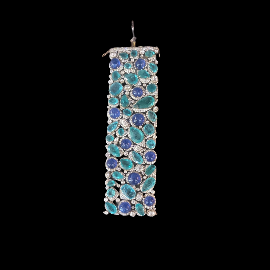 Mahesh Notandas Jewellers Ocean Mosaic bracelet featuring blue and turquoise precious coloured gemstones with brilliant white accents. 