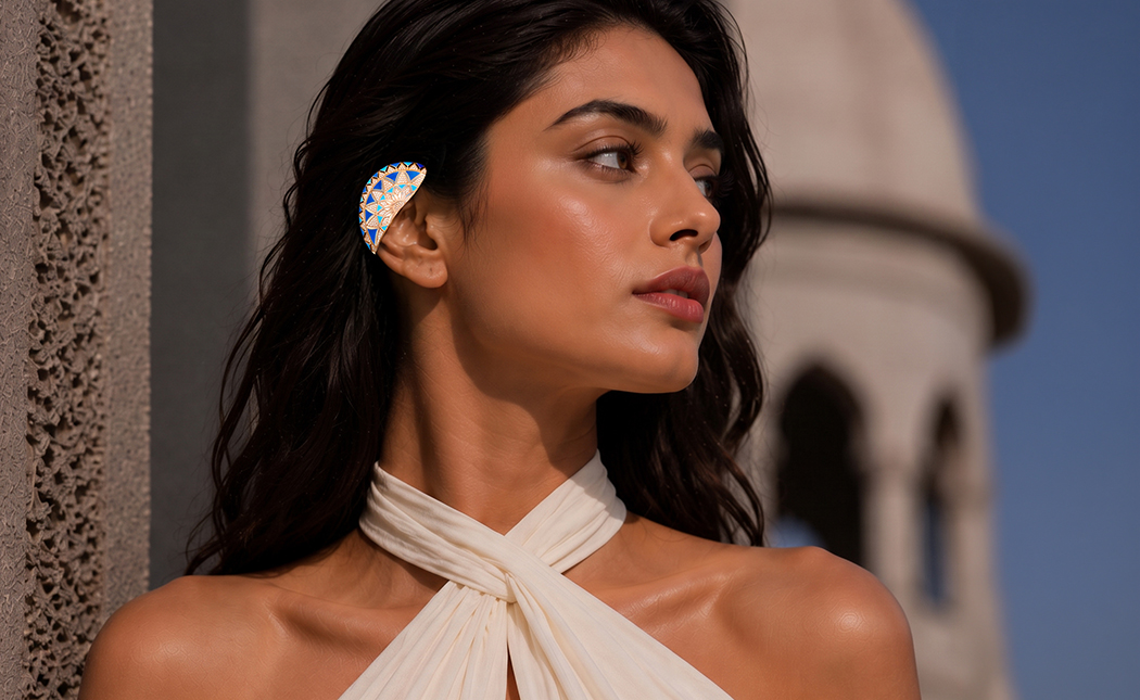 Model wearing The Moroccan Arch blue and rose-gold geometric ear cuff by Vummidi Bangaru Jewellers.