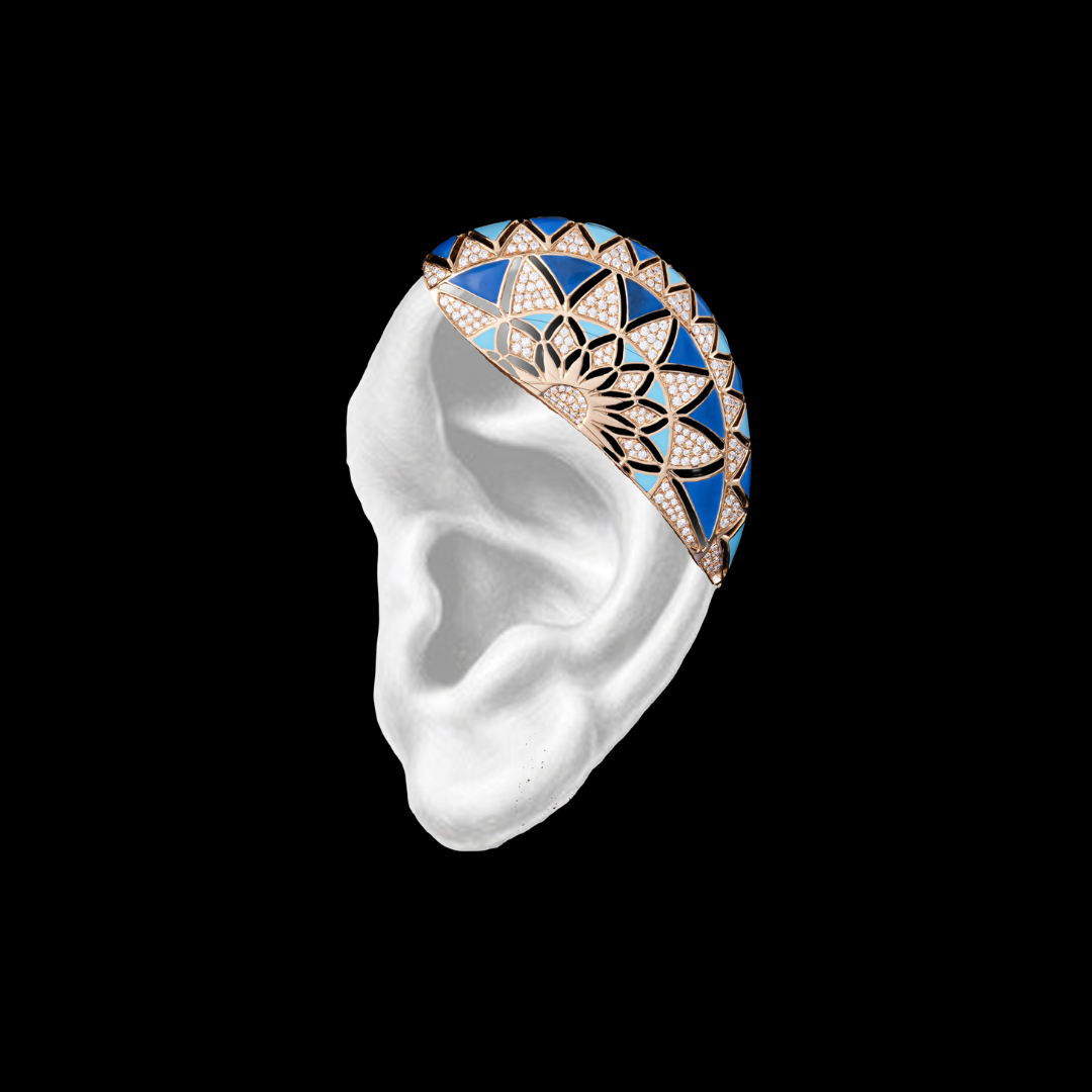 The Moroccan Arch ear cuff by Vummidi Bangaru Jewellers featuring blue, white and rose-gold toned geometric mosaic detailing. 