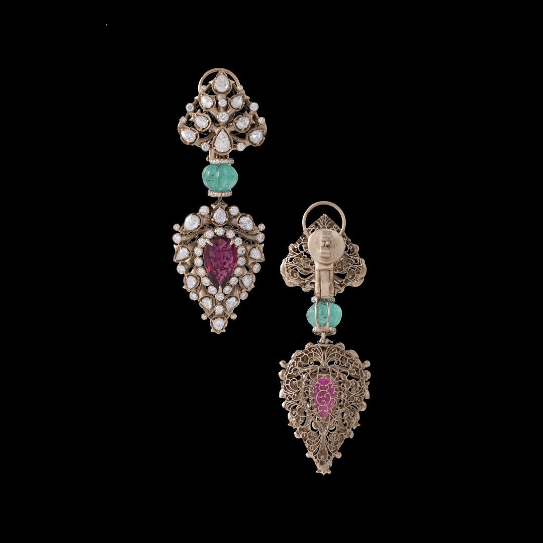 Vummidi Bangaru Jewellers Nizara Polki earrings featuring uncut diamonds with pink and turquoise gemstone accents